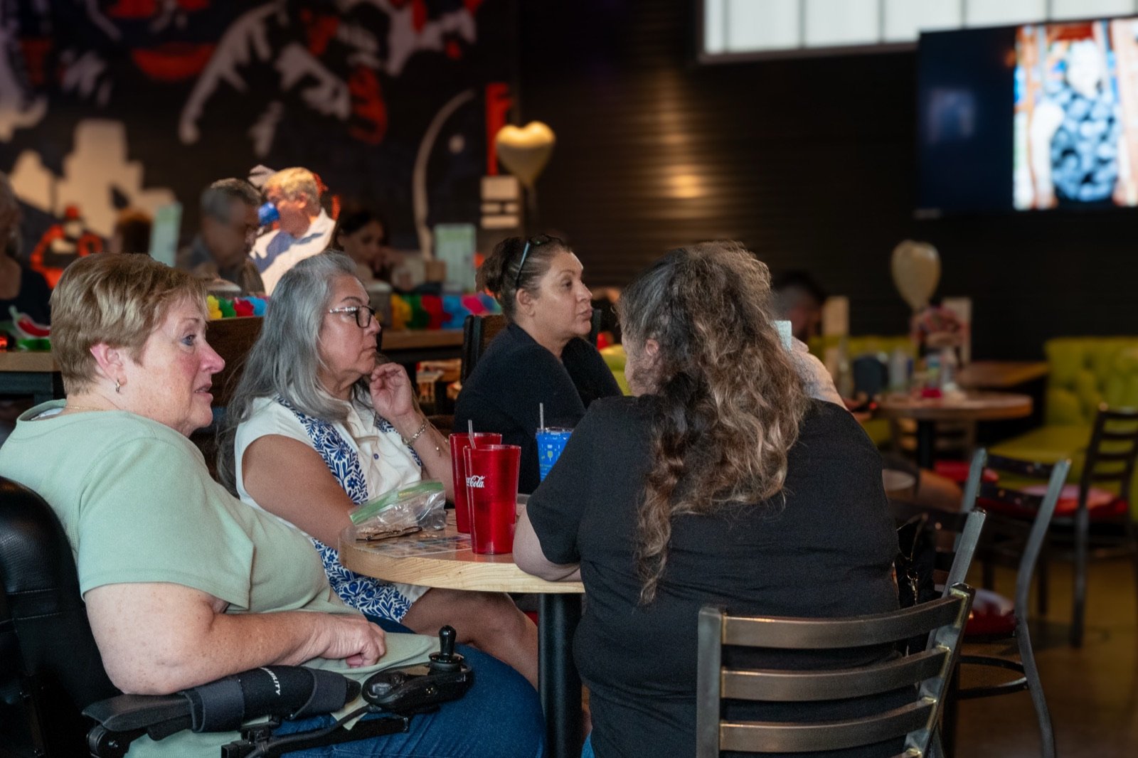 A full house of guests at their tables
